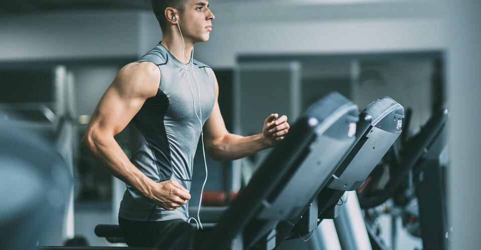 A man exercising in a gym